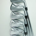 A set of five Callaway iron golf clubs arranged in a fan shape on a plain white background.