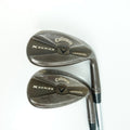 Two Callaway X Series Jaxie golf wedges with dark metallic heads and silver shafts, photographed on a clean white background.